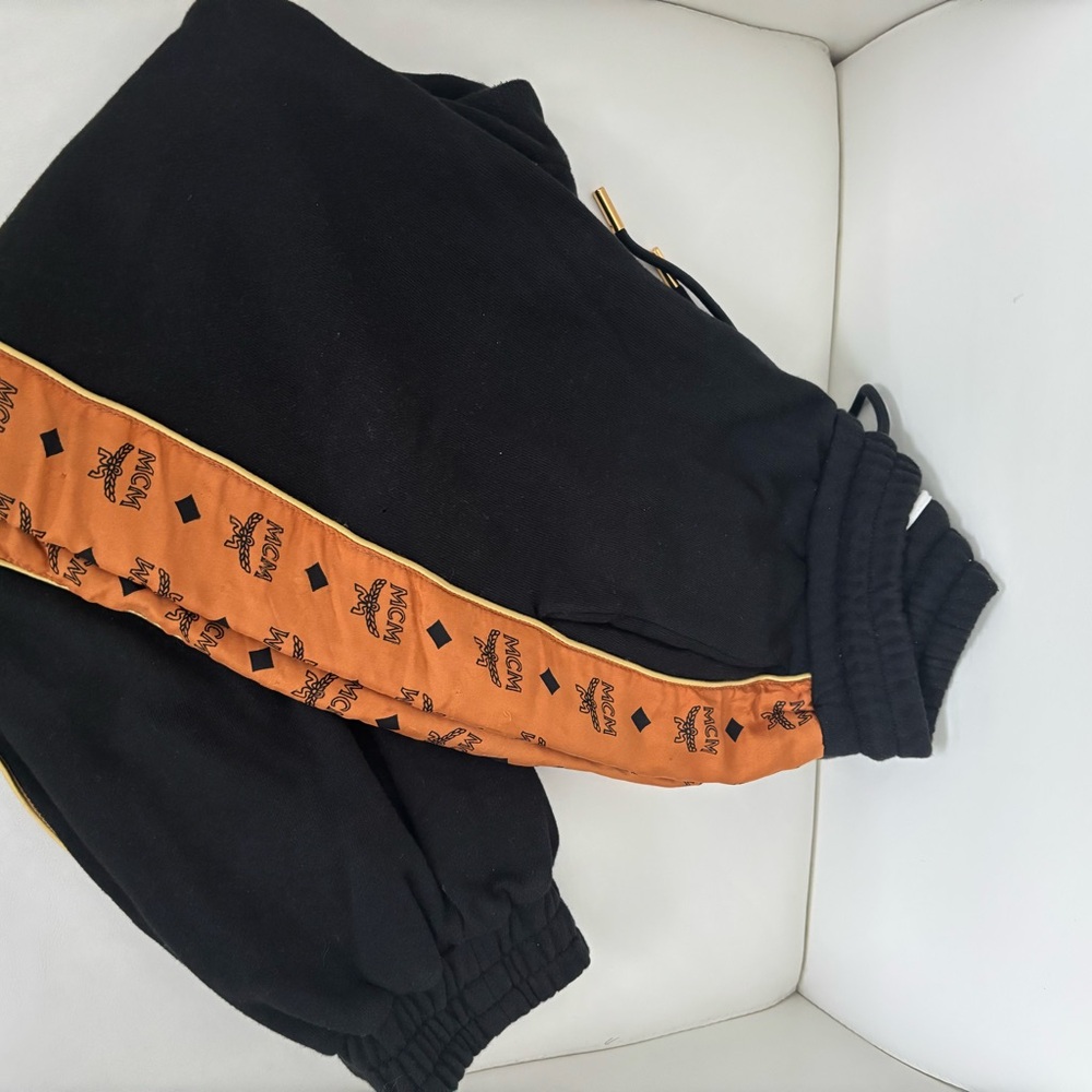 MCM Black and Orange Sweatpants with Bold Design